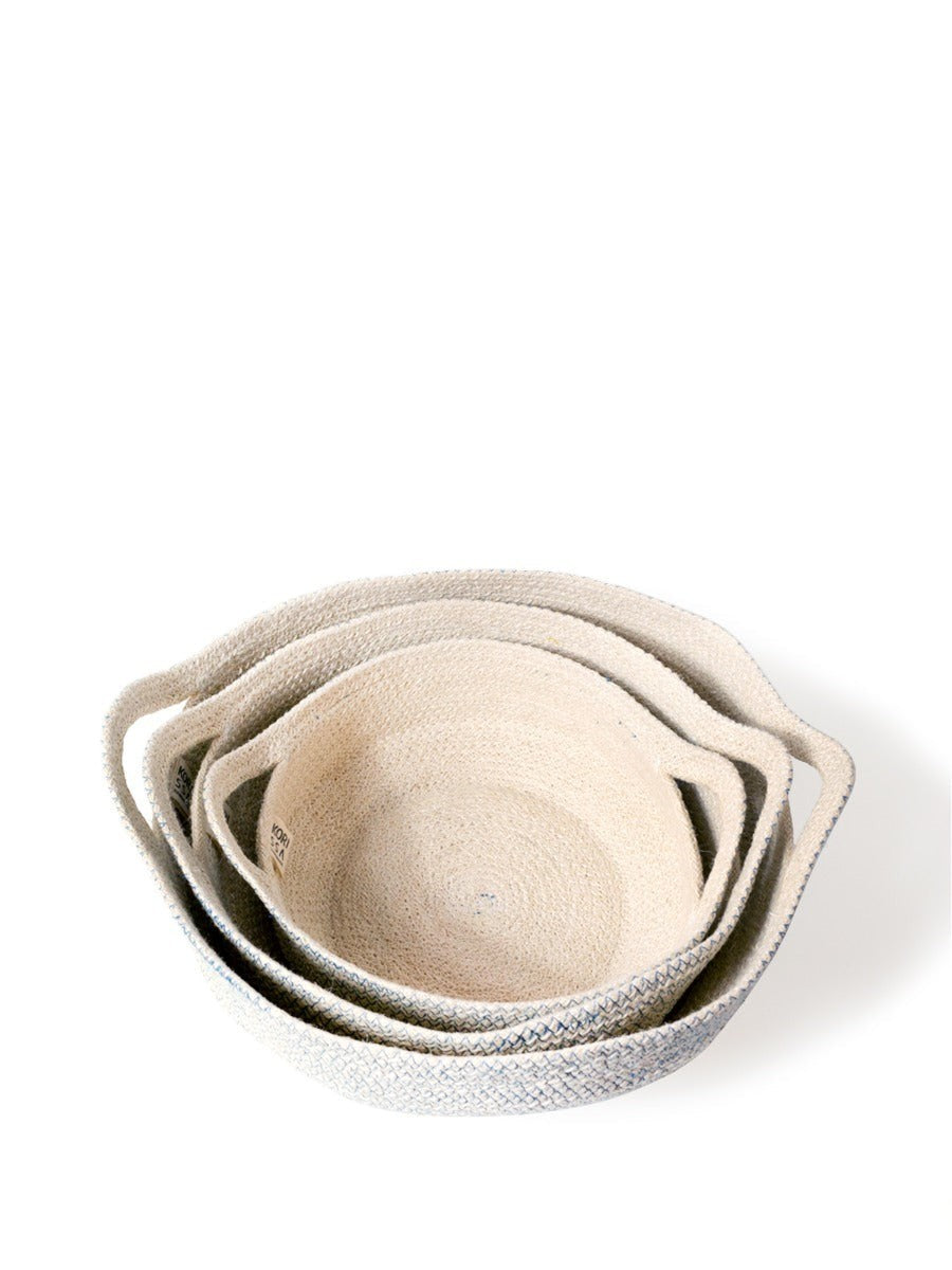 ALARA LOFTHandwoven jute fruit bowls in off-white with blue stitching. Set of 3 nesting bowls with handles.